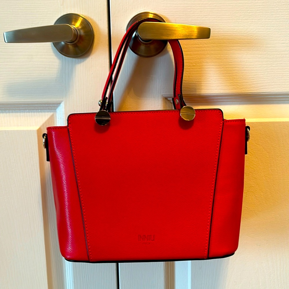 Red leather handbag